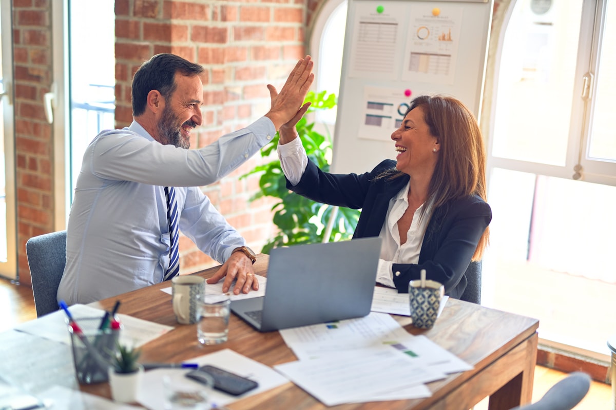 Energy analyst reviewing consumption data with client